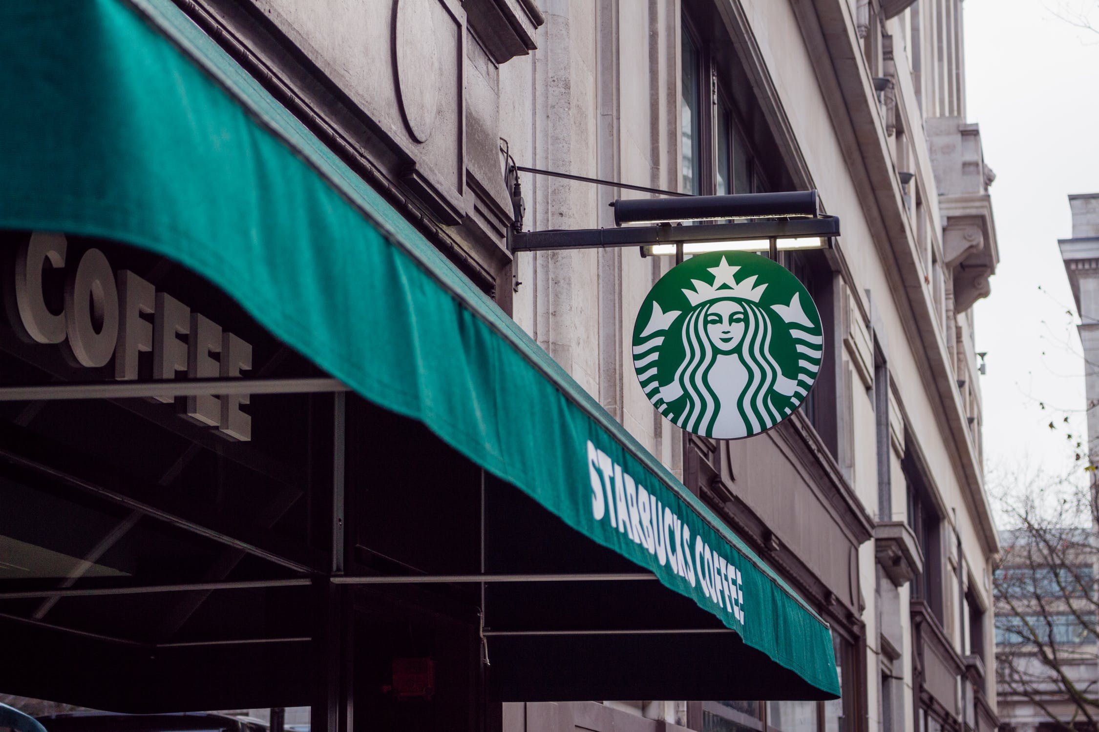Starbucks sign above cafe