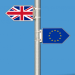 Road signs showing EU flag and Union Jack, symbolising Brexit